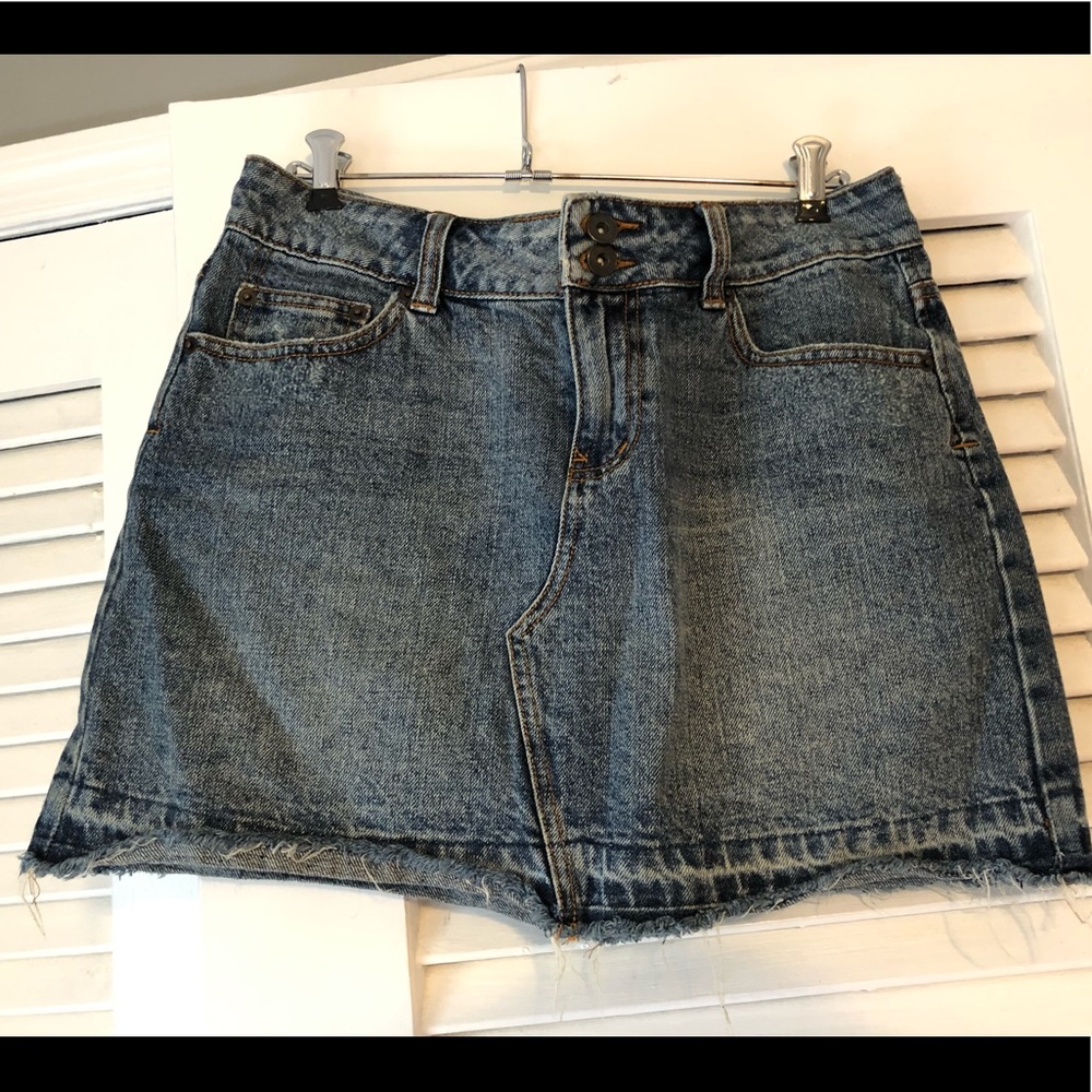 Denim mini skirt with distressed hemline